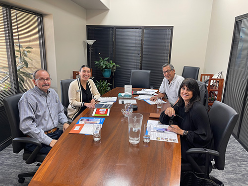 Group of LULAC 10 leaders seated at a table